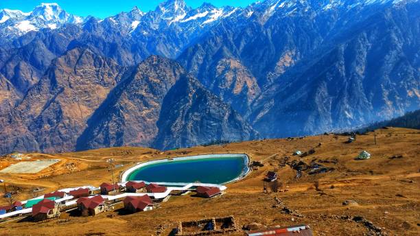 Lush meadows in Auli with mountain backdrop