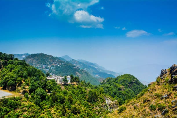 Misty landscape of Mussoorie with monsoon greenery